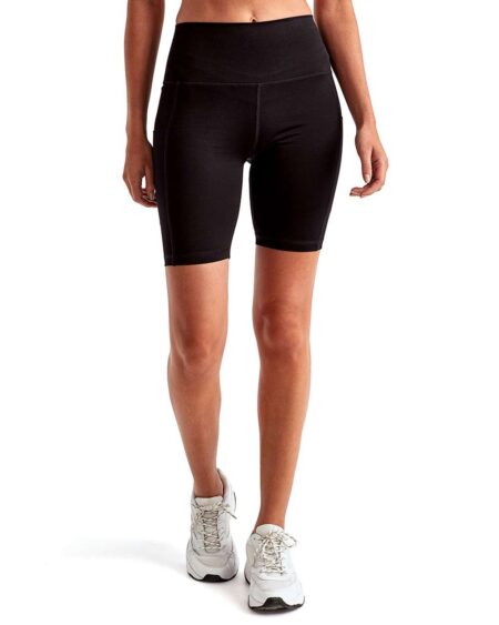 Front view of a model wearing black TriDri women’s performance compression shorts