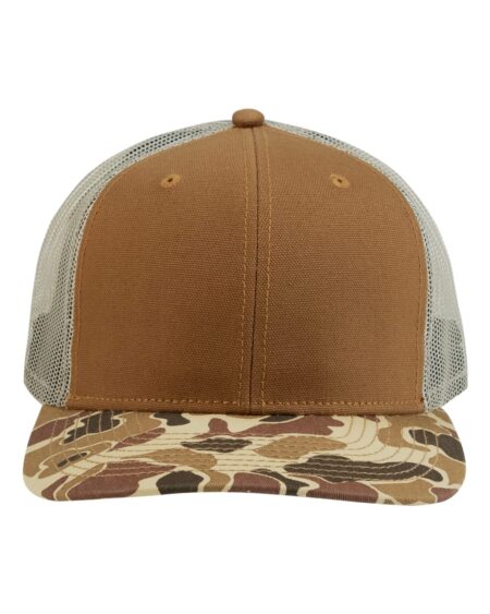 Front view of the DRI DUCK 3091 Ridge Trucker Cap in Saddle with a duck camo bill